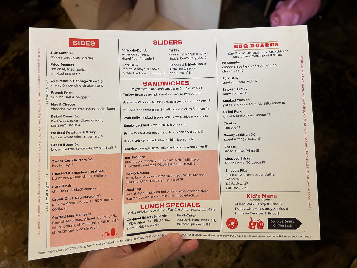 red and white menu with entree options and sides